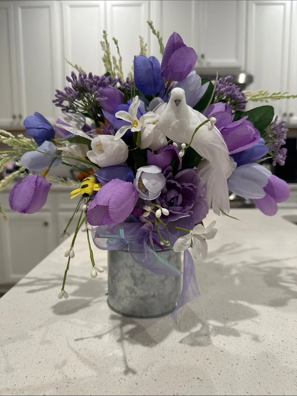 Artificial Purple and White Floral Arrangement with Decorative Bird